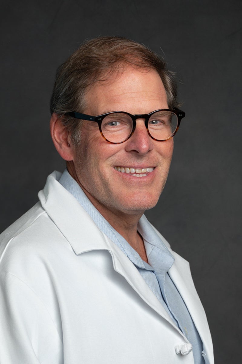 Professional headshot of John P. Krcmarik, M.D., FCCP