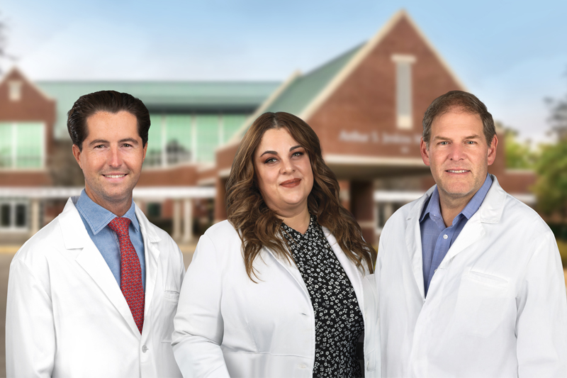 Andrew Stevens, M.D., Shawna Nievierowski, N.P, and John Krcmarik, M.D. in front of Lowcountry Medical Group building