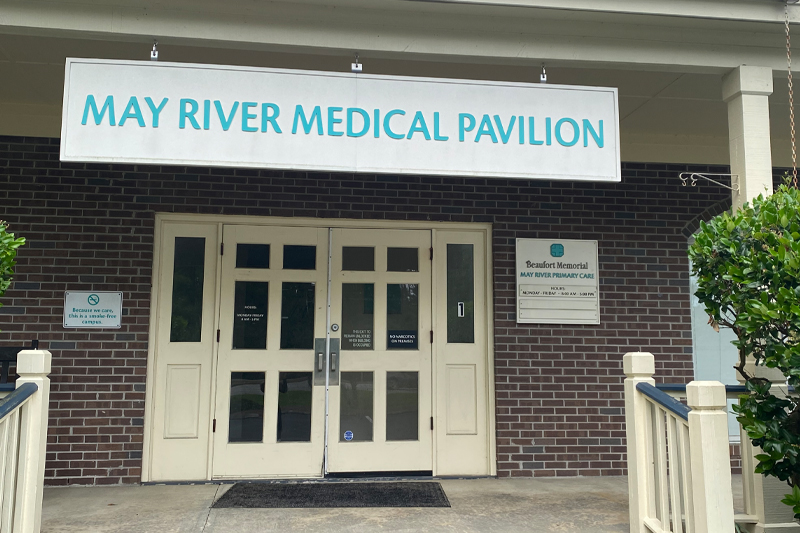 Exterior view of the main door and building signage at May River Medical Pavilion