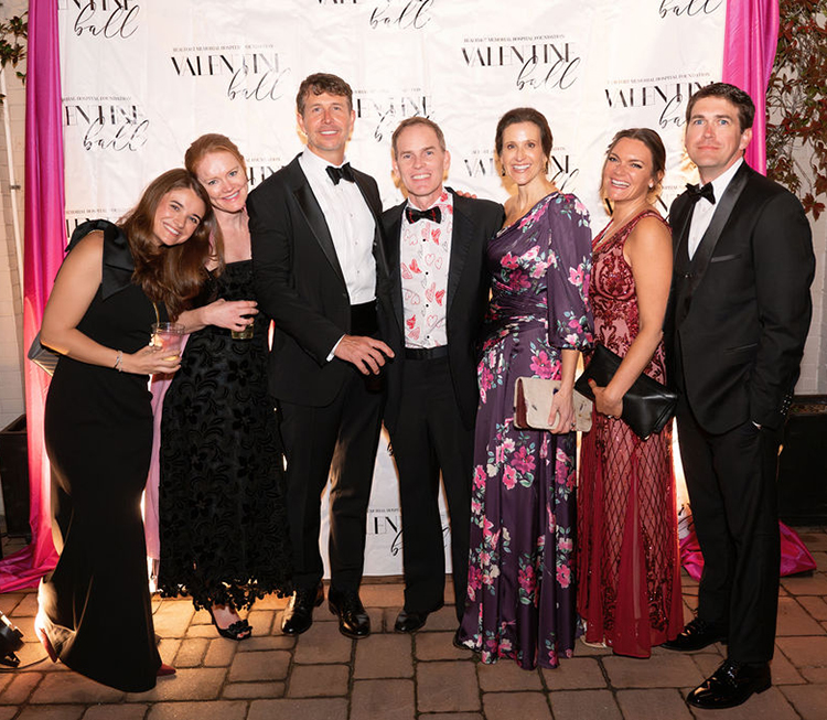 Nancy Askew, Ashley Wilson, Dr. Lou Plzak, Andy Burris, Marci Burris, Nikki Baker and Matt Baker pose at the Beaufort Memorial Foundation's Valentine Ball in February 2025