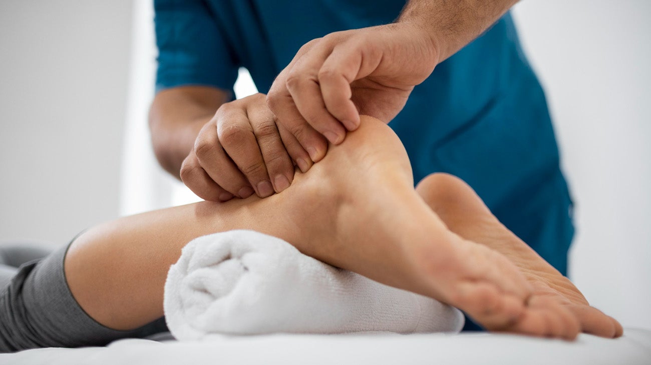 Provider Examining a Patient with Foot and Ankle Pain