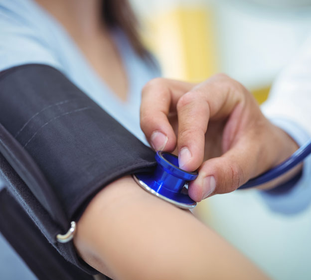 Patient's blood pressure being taken