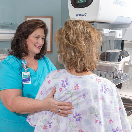 woman having a mammogram