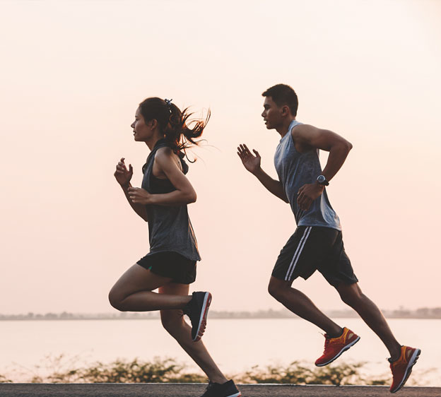 Couple running on the beach