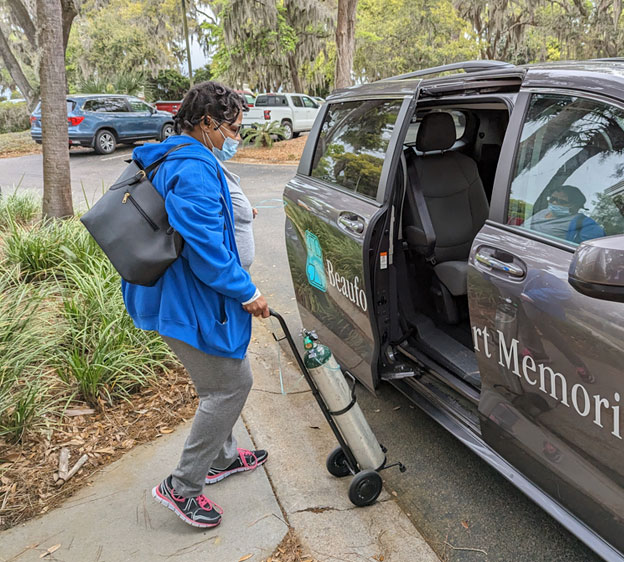 Dovetta Wilson, a patient at the Beaufort Memorial Sickle Cell Clinic, boards a Beaufort Memorial transportation van.