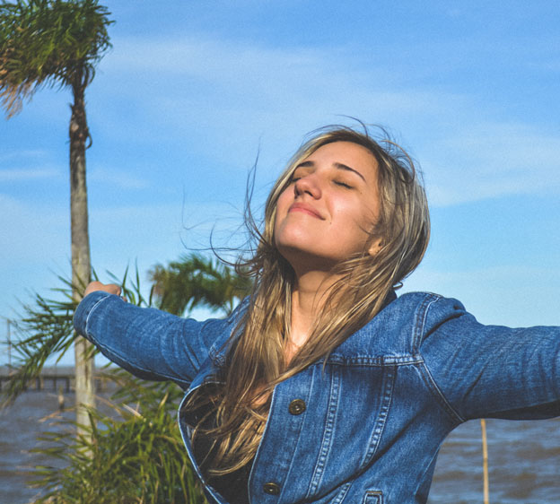 Woman taking a deep breath