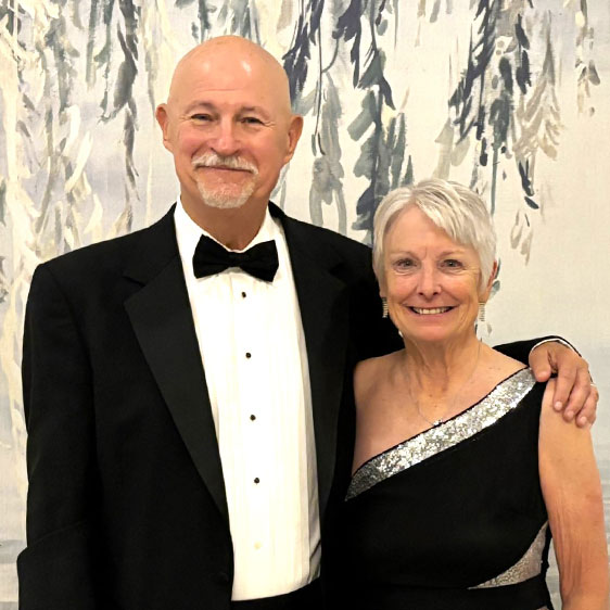 Sue Zankowski and her husband John photographed in black and white formalwear