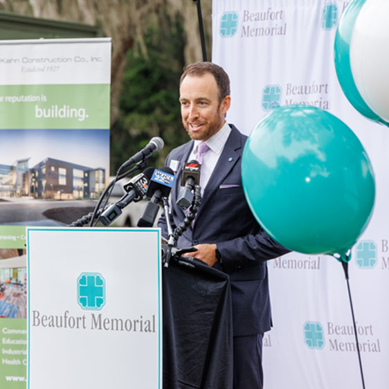 Russell Baxley provides remarks behind a podium