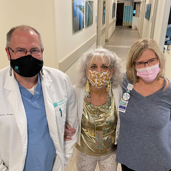 Barbara Ottaway with radiation oncologist Dr. Jonathan Briggs and Sharon Rourk