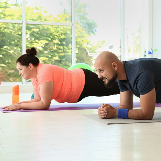 woman and man exercising