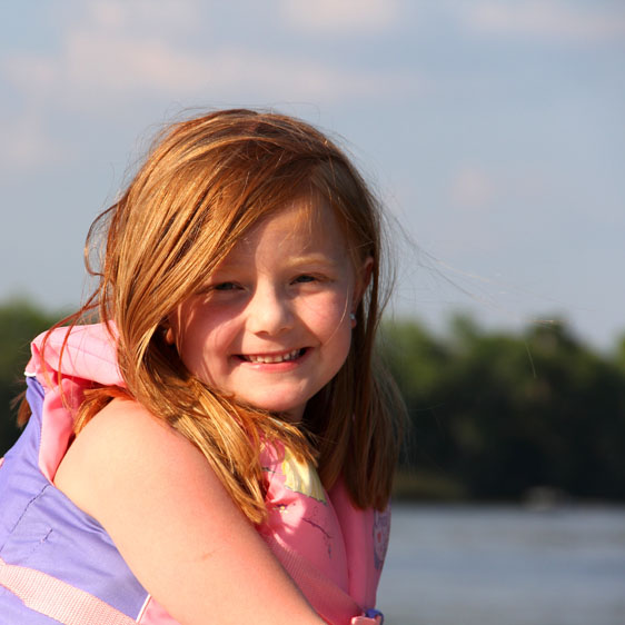 young girl in life jacket