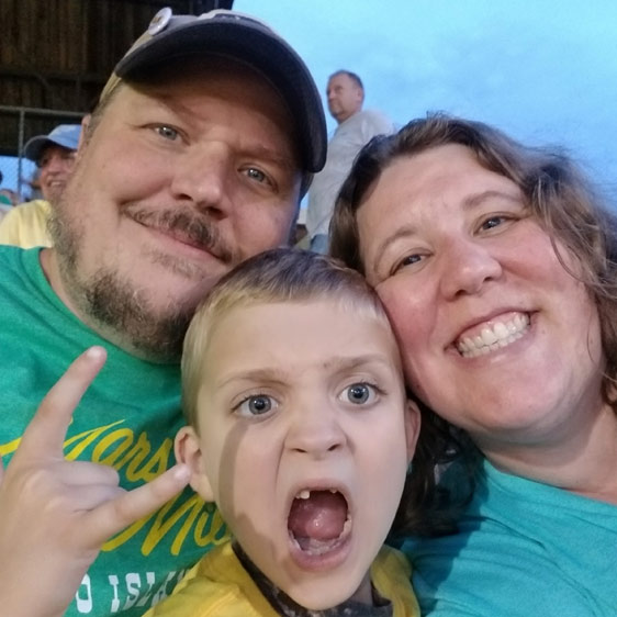 A close-up family photo of Paul, Luke and Nikki Newman