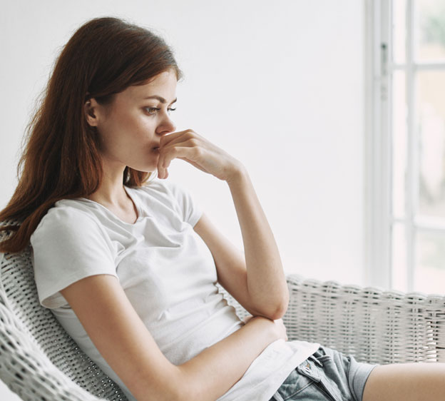 Young woman sitting in a chair