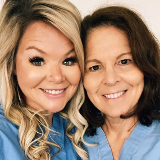 A recent selfie of Carol Thames and Chelsey Bates photographed in their nurse scrubs