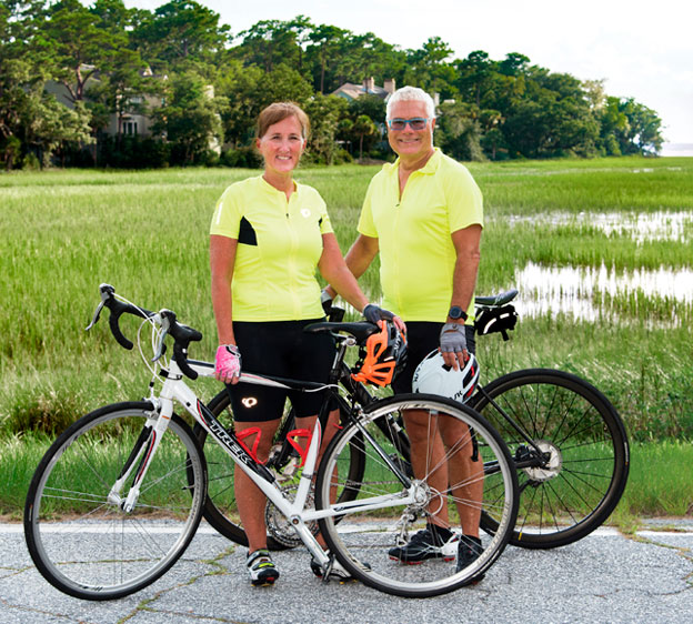 Dr. Rhonda Wallace and her husband on bicycles