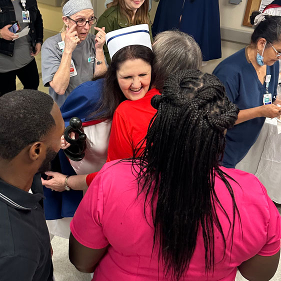 A BMH employee hugs Lisa Terwilliger, RN, who received The DAISY Award