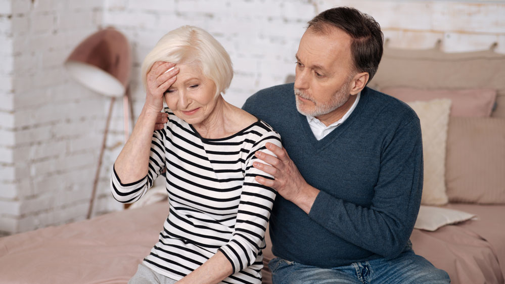 confused woman with concerned husband