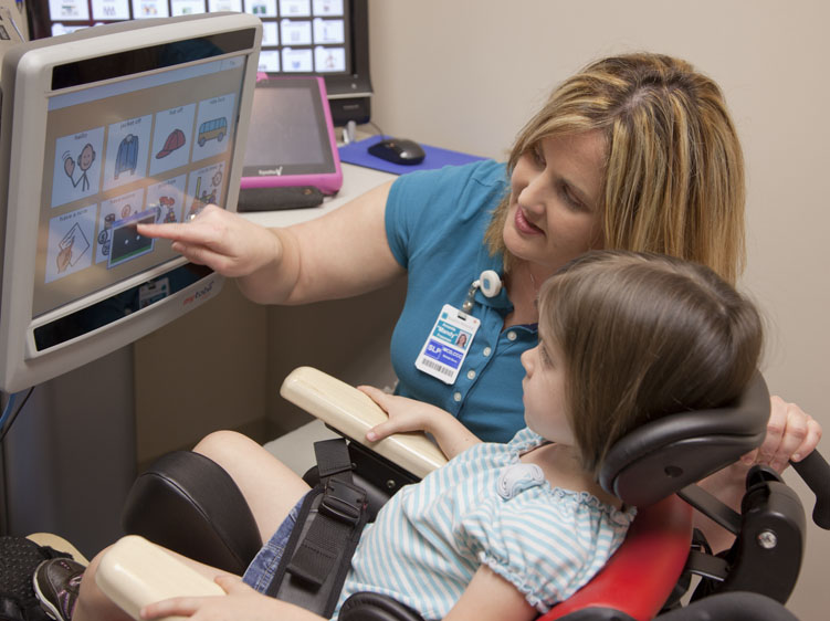 therapist working with a childe on eye gaze