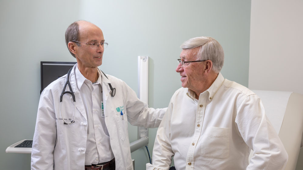 internal medicine physician Philip Cusumano, MD, with patient