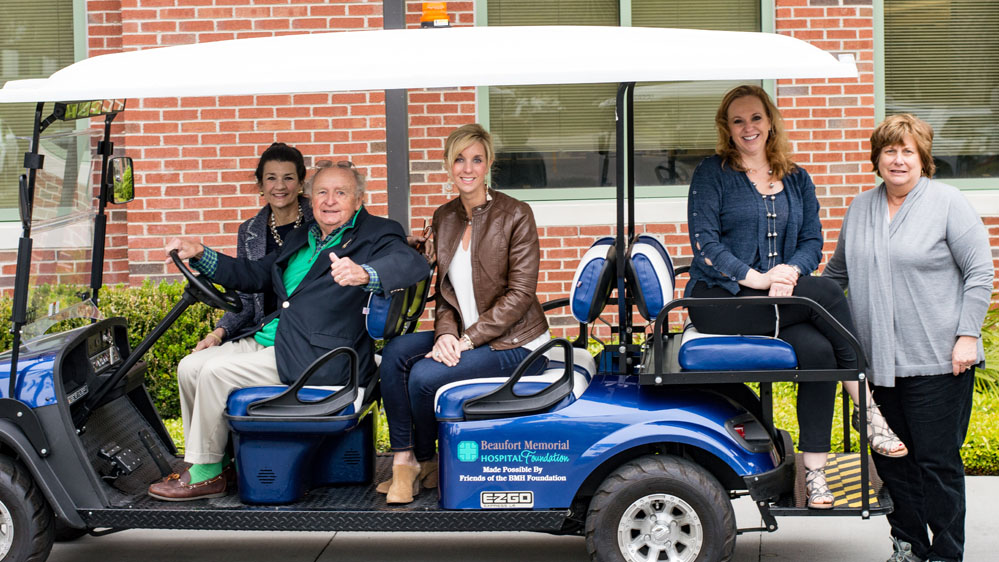 Golf cart with board members