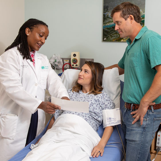 doctor at patient bedside